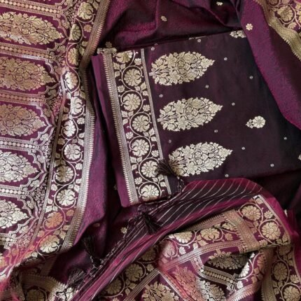 Beautiful wine color tanchui silk adorned with zari work fabric